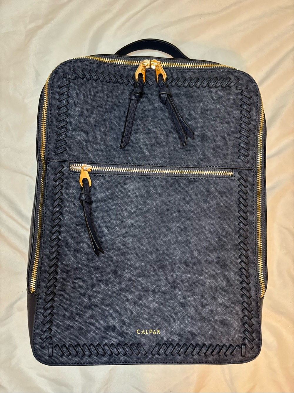 CALPAK Navy Blue Laptop Backpack with Gold Hardware and Woven Trim